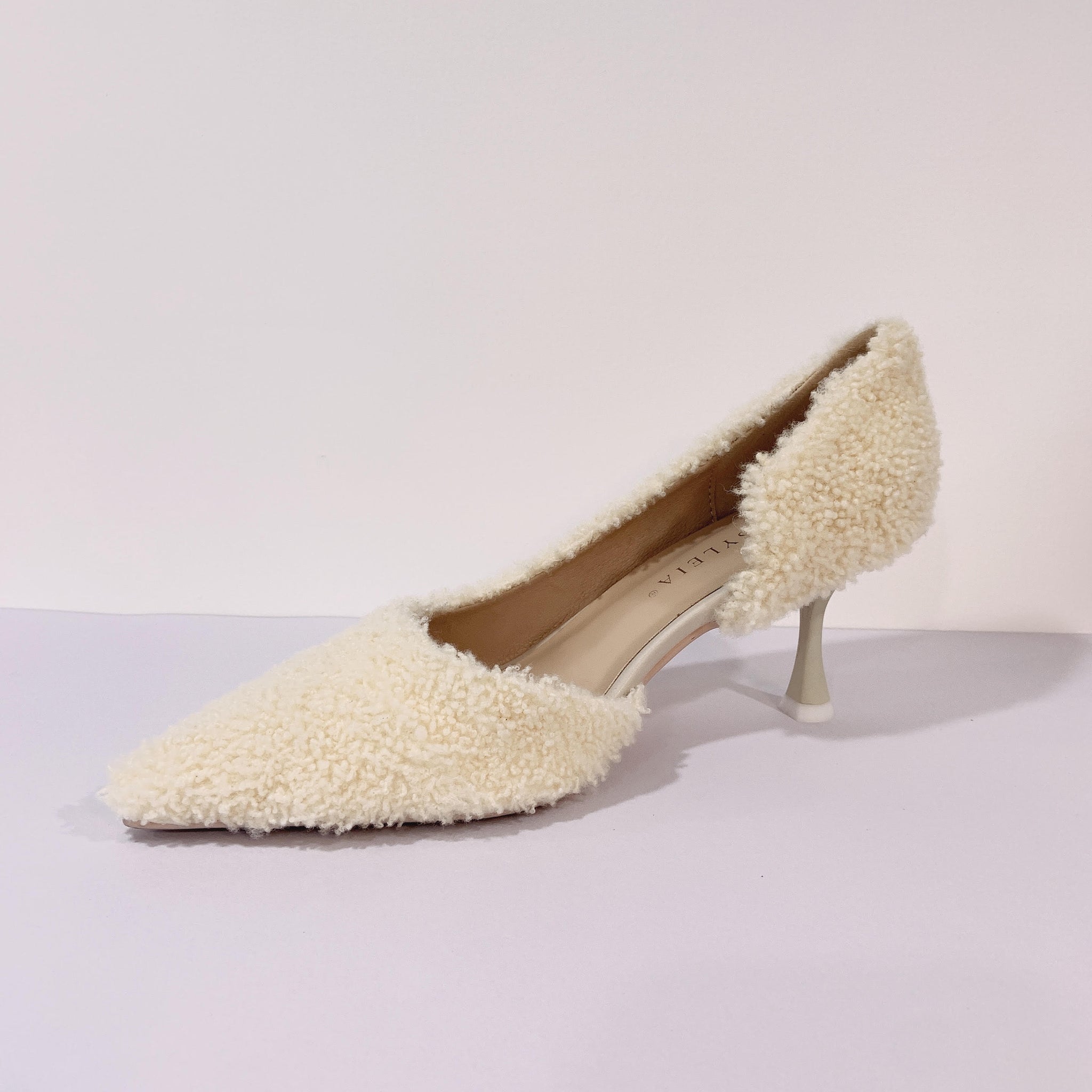 Off White Shearling Pumps